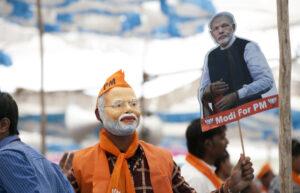 Man Wearing a Narendra Modi Mask