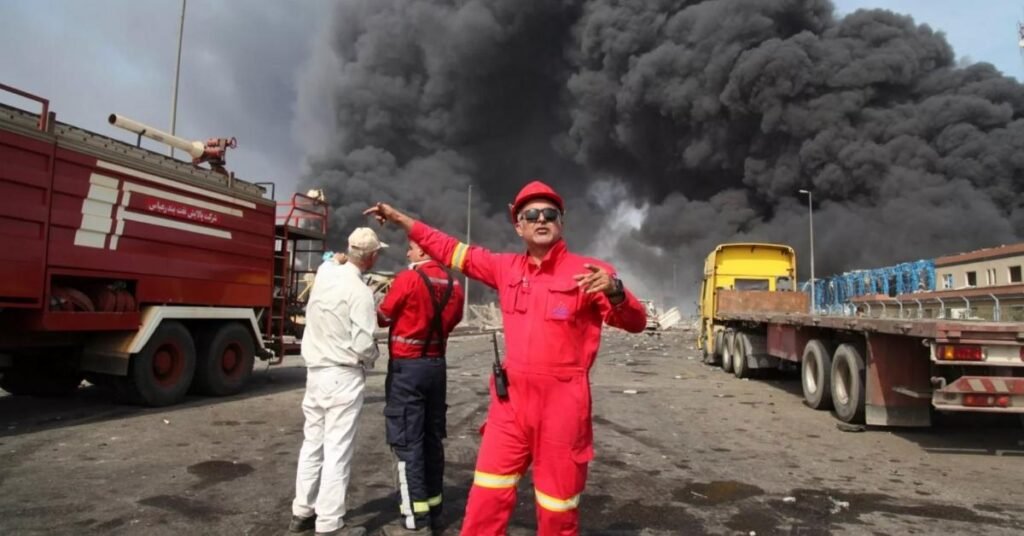 Firefighters work as black smoke rises in the sky after a massive explosion rocked a port near the southern city of bandar abbas, 26 april 2025 - copyright irna via ap